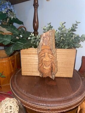 Planter box with spirit face wood carving